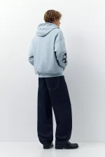 Sudadera capucha cremallera parches 2.webp