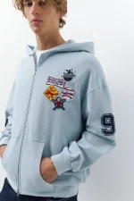 Sudadera capucha cremallera parches 3.webp