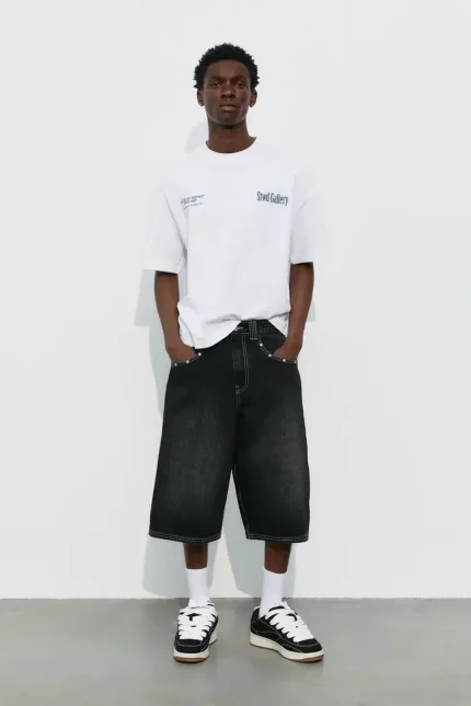 pantaloncini di jeans borchiati STWD